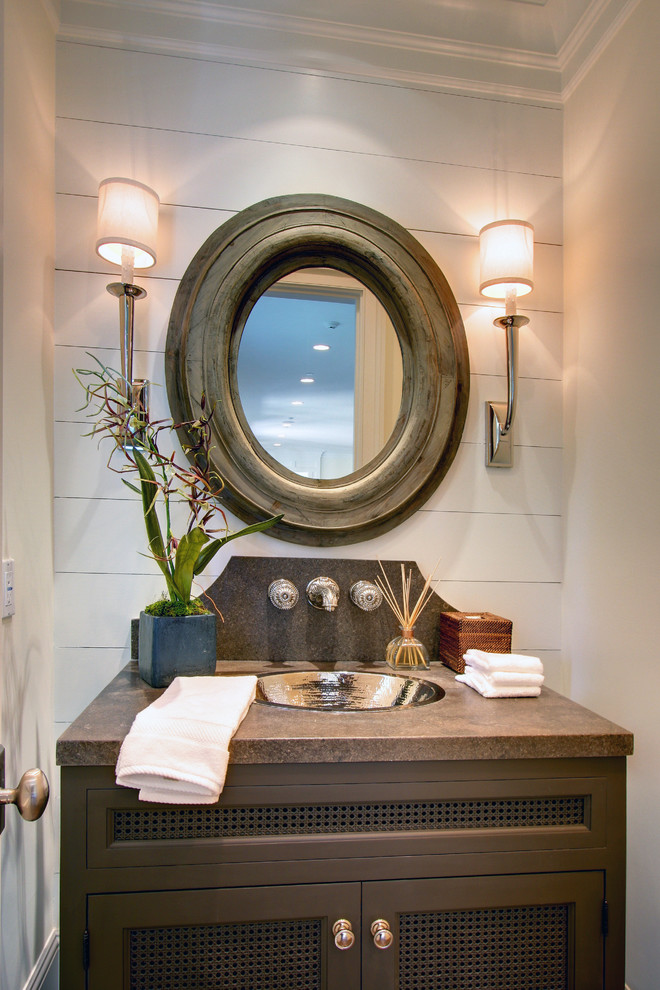 Mirrored Wall Sconce Powder Room Traditional with Beige Wall Brown Countertop