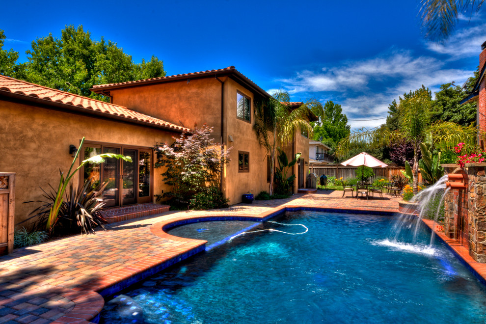 Modern Umbrella Stand Pool Mediterranean with Custom Waterfeature at Pool