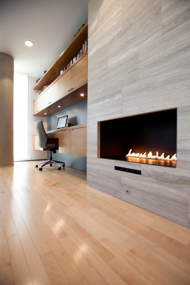 Ocean Blue Travertine Family Room Contemporary with Condo Fireplace Modern Stone