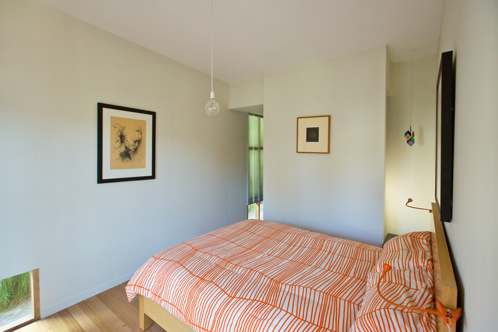 Orange Duvet Cover Bedroom Contemporary with Globe Pendant Light Hardwood