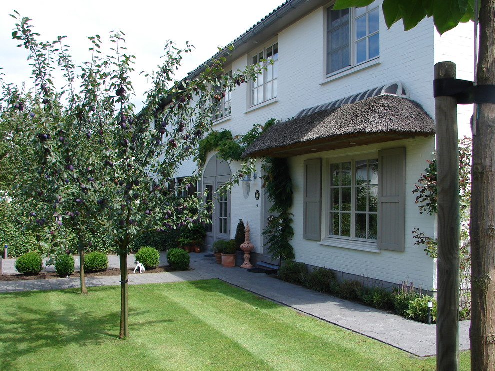 Outdoor Window Shutters Exterior Traditional with Arched Doorway Boxwood French