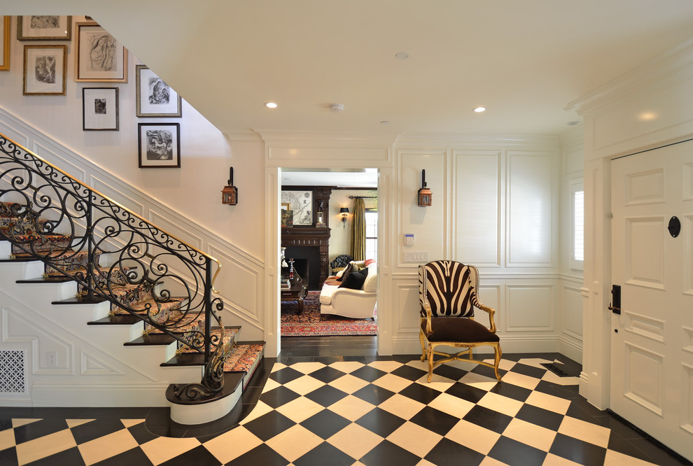 Picture Frame Paneling Entry Traditional with Area Rug Black Treads