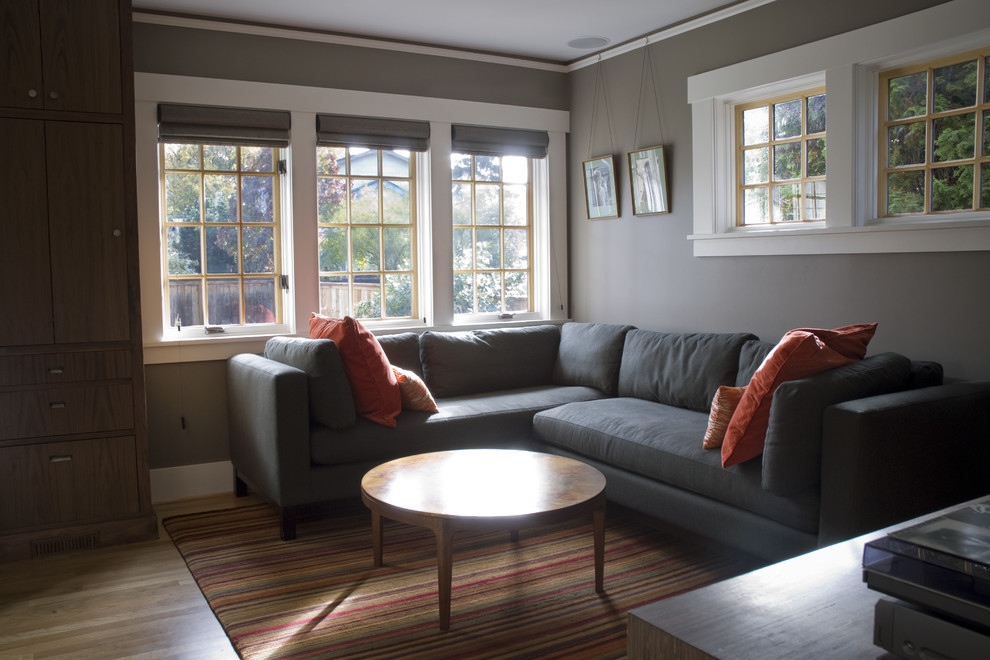 picture rail molding Family Room Traditional with built-in wood cabinets picture