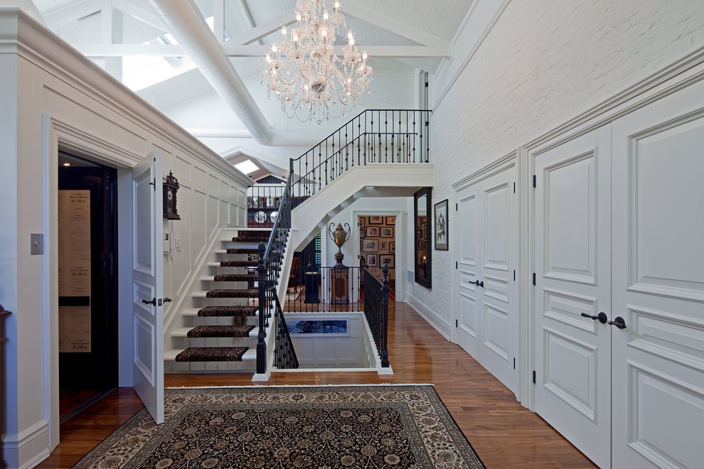 Raised Panel Doors Staircase Contemporary with Closets Crystal Chandelier Hardwood