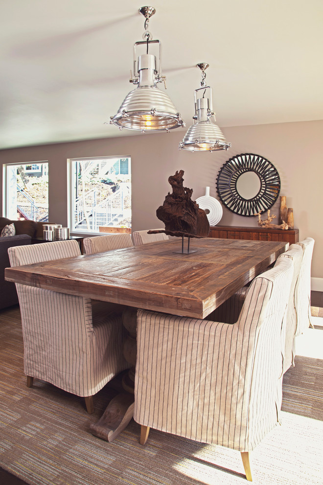 Reclaimed Wood Dining Table Dining Room Eclectic with Artwork Beige Patterned Rug