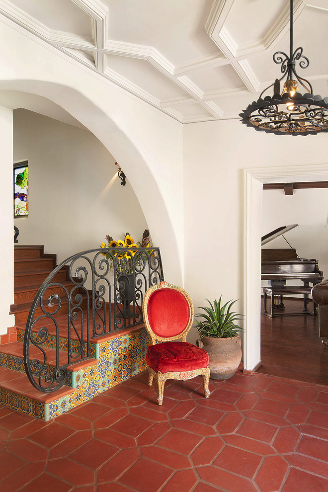 Red Tile Flooring Entry Mediterranean with Archway Ceiling Molding Door