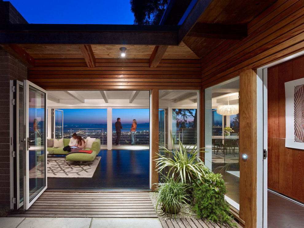 Retractable Doors Interior Entry Midcentury with Balcony Container Plants Courtyard