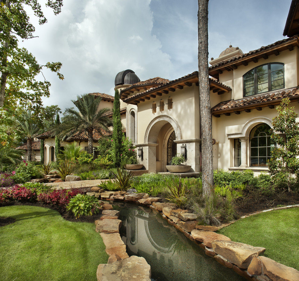 River Rock Landscaping Exterior Mediterranean with Arch Doorway Arch Entryway1