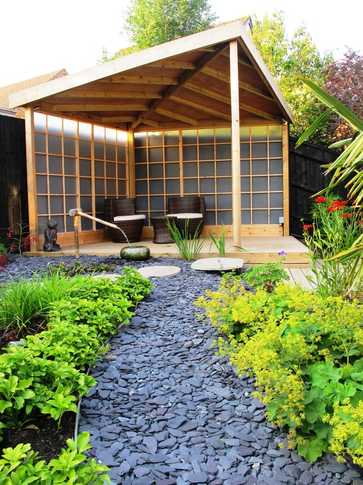 River Rock Landscaping Landscape Asian with Arbour Bushes Covered Deck1