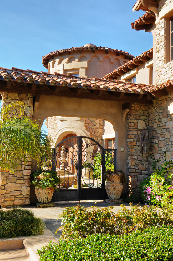Rod Iron Gates Entry Mediterranean with Container Plants Entry Gate