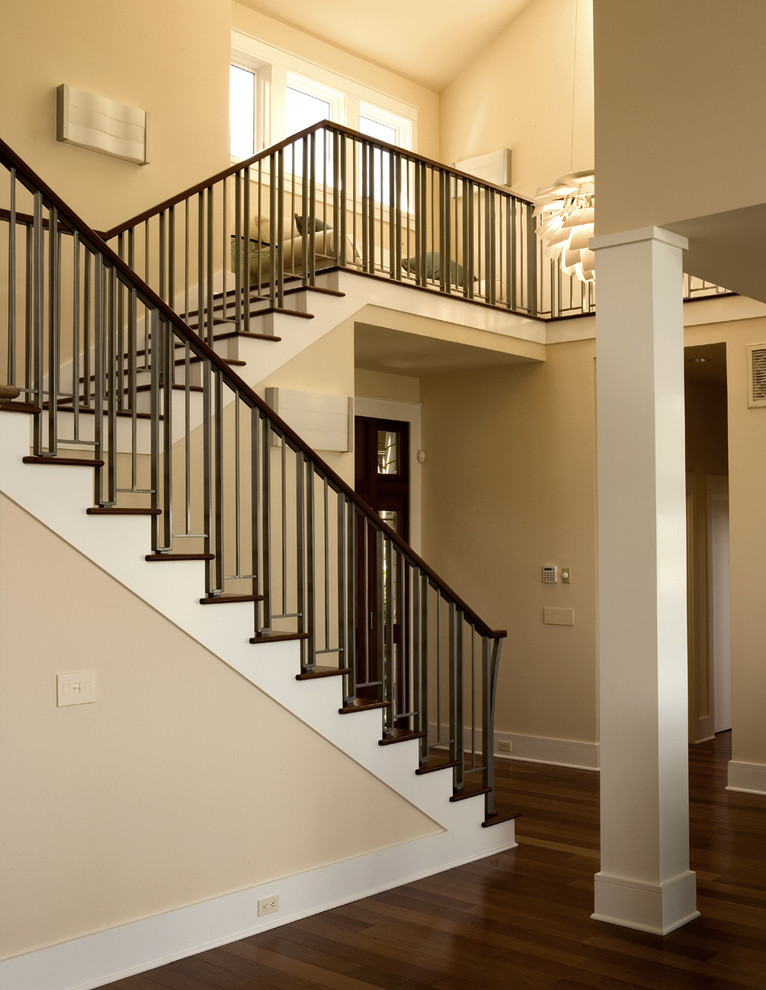 Rod Iron Railing Staircase Contemporary with Beam Chandelier Column Dark