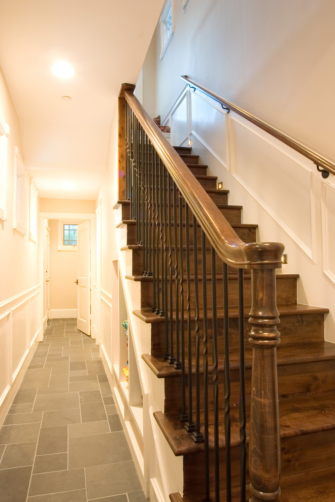Rod Iron Spindles Staircase Traditional with Dark Floor Metal Banister