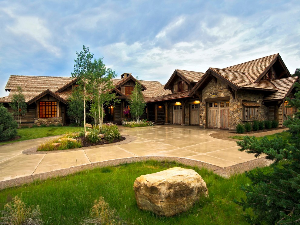 Rustic Garage Doors Exterior Rustic with Boulders Chinked Siding Concrete
