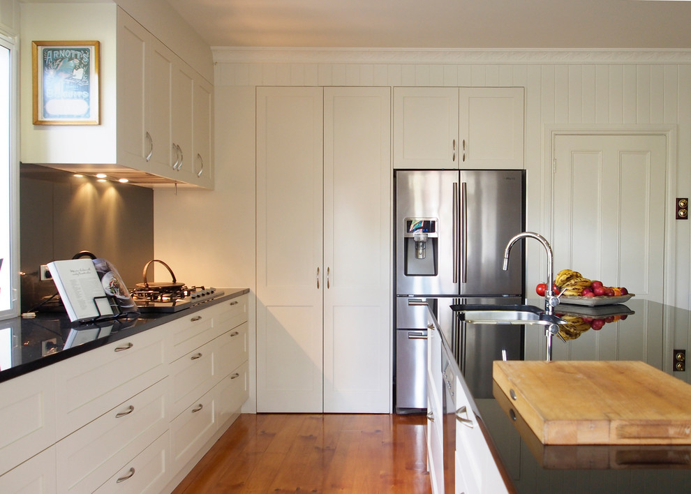shaker style cabinets Kitchen Contemporary with 2pac black granite Bright