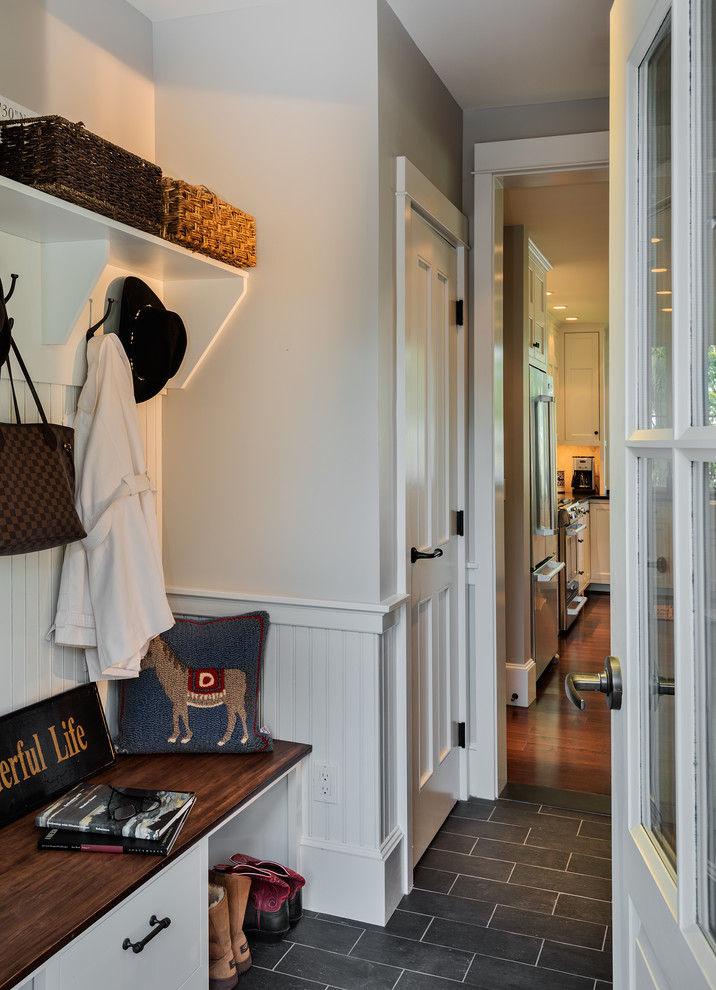 Slate Tile Flooring Entry Beach with Beadboard Wainscoting Bench Closet