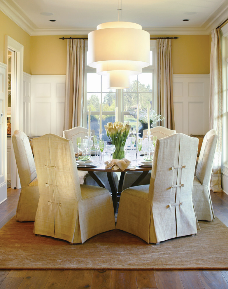 Slipcovered Dining Chairs Dining Room Traditional with Area Rug Ceiling Light