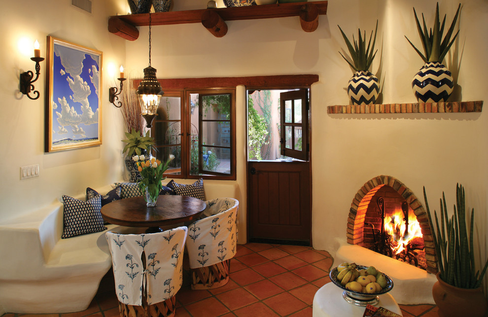 Space Saver Dining Table Dining Room Mediterranean with Arched Fireplace Arizona Remodel