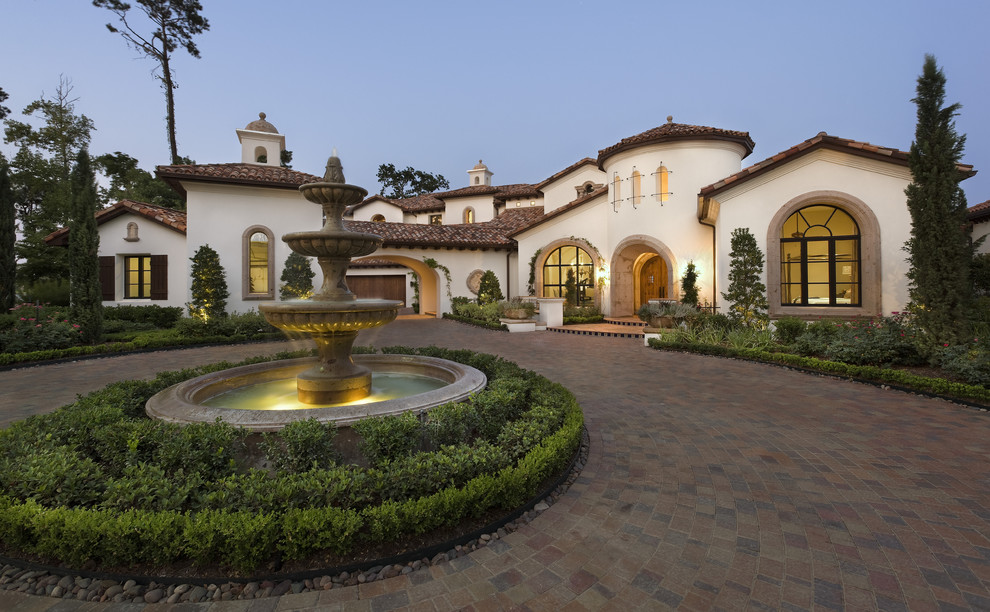 Spanish Tile Roof Exterior Mediterranean with Arched Windows Brick Driveway