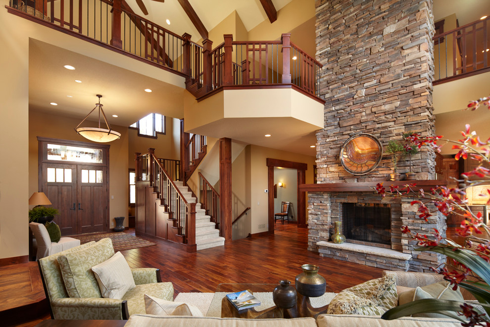 Stacked Stone Fireplace Living Room Traditional with Armchairs Beige Sofa Family