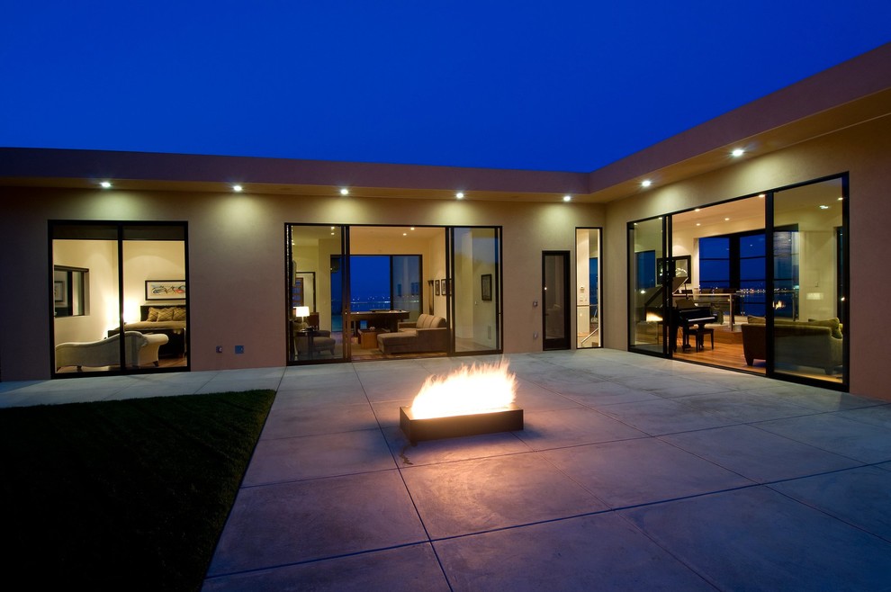 Stacked Stone Tile Patio Contemporary with Back Yard Casement Windows