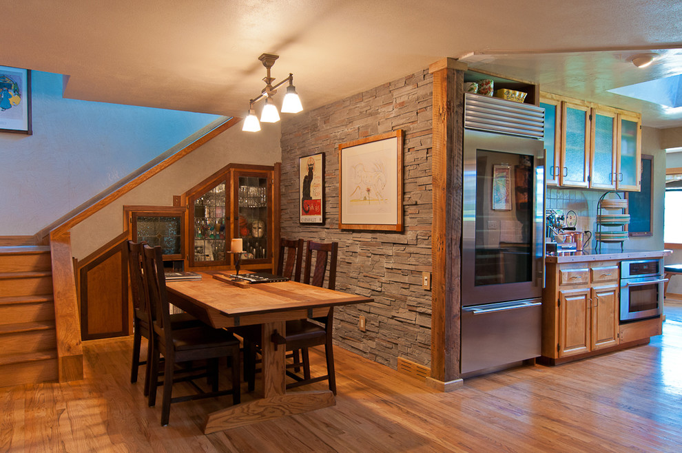 Stacked Stone Wall Dining Room Traditional with None 