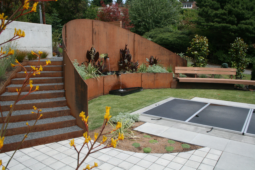 Steel Building Homes Landscape Contemporary with Bench Concrete Paver Curve