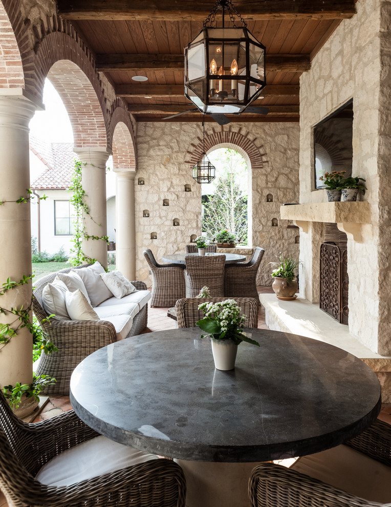 Stone Table Tops Patio Mediterranean with Arched Openings Brick Columns