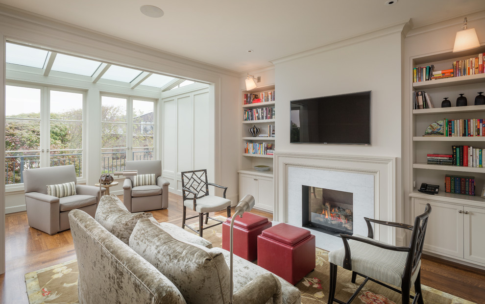 Sunroom with Fireplace Living Room Traditional with Beige Bookcase Beige Fireplace