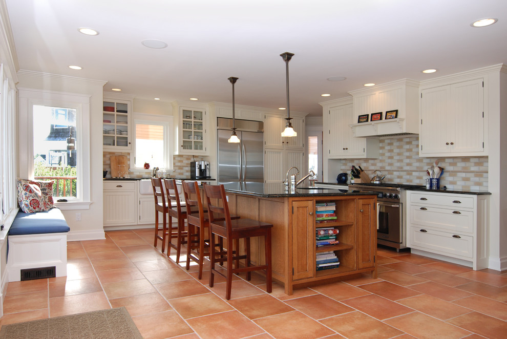 Terra Cotta Tile Kitchen Beach with Beadboard Cabinets Cream Walls1