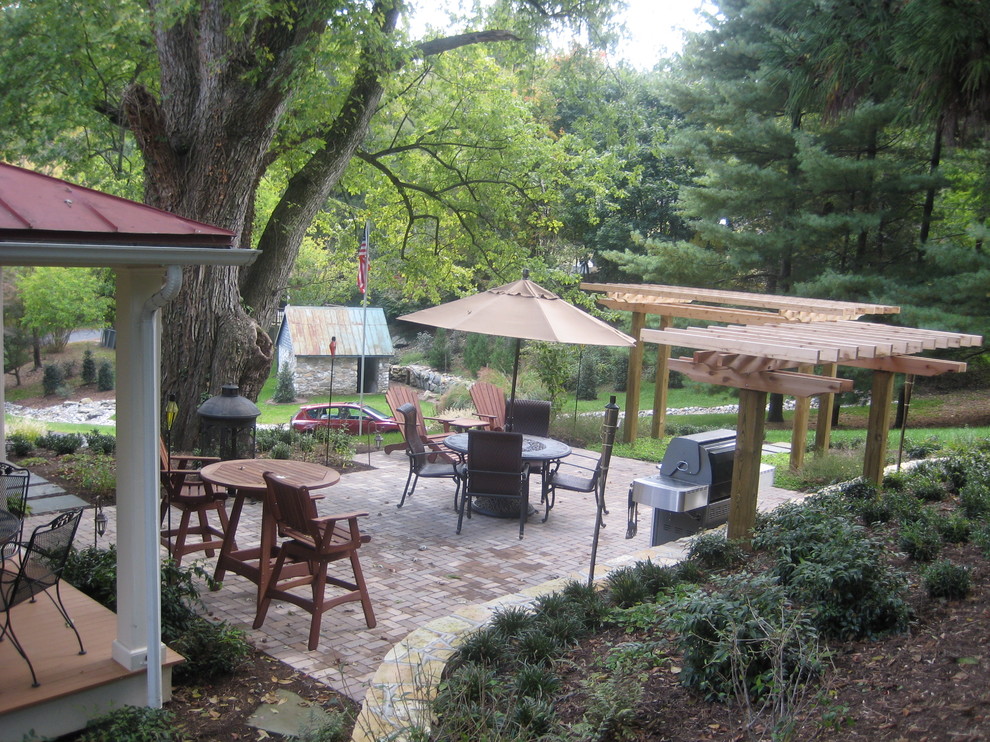 Two Post Pergola Patio Rustic with Brick Paving Hillside Outdoor