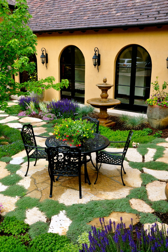 Urn Water Fountain Patio Mediterranean with Arched Windows Black Chairs