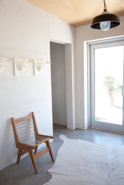 White Cowhide Rug Spaces Contemporary with Adobe Architecture Minimalism Modern
