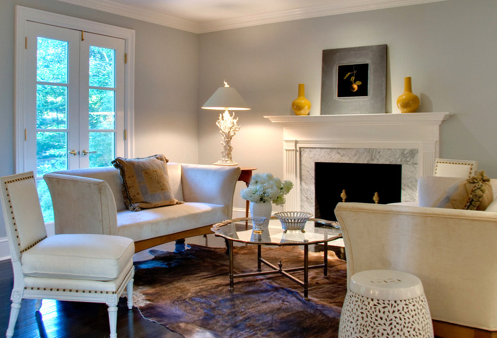 White Marble Fireplace Living Room Traditional with Animal Hyde Ceramic Stool