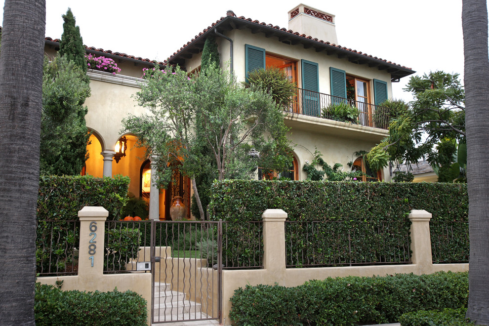 Wrought Iron Fence Designs Exterior Mediterranean with Arched Windows Arches Balcony