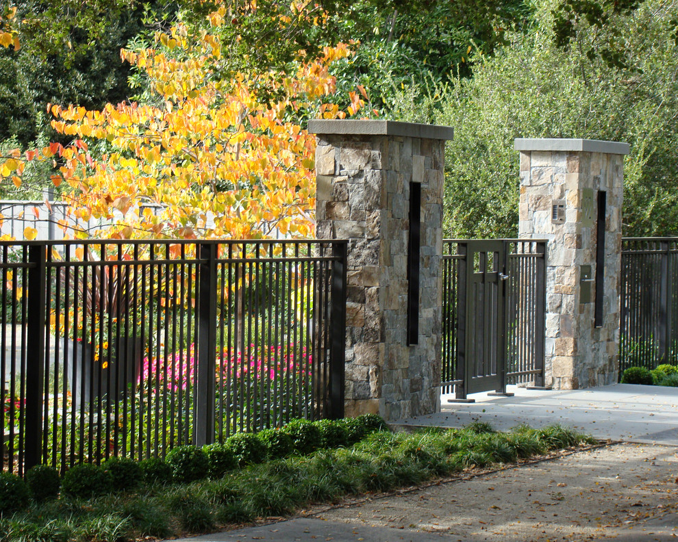 Wrought Iron Fences Landscape Traditional with Columns Entry Gate Gravel