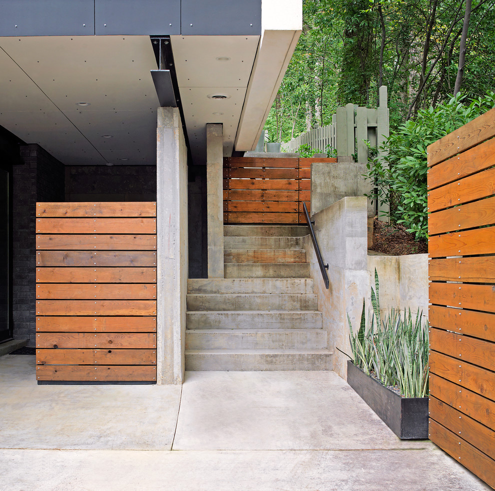 Wrought Iron Spindles Staircase Contemporary with Concrete Patio Concrete Steps