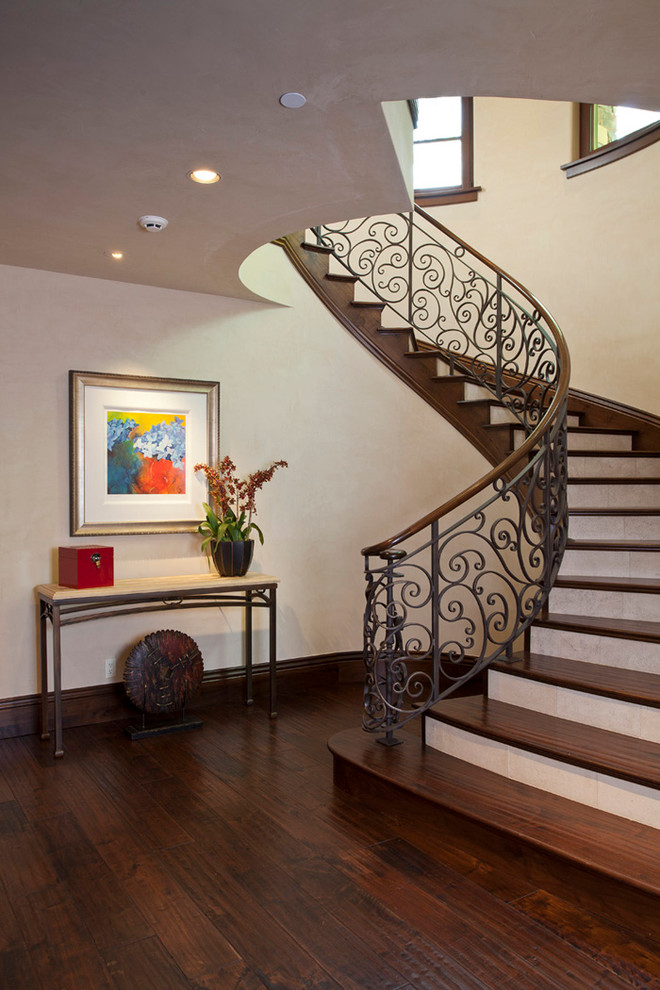 Wrought Iron Stairs Staircase Mediterranean with Baseboards Beige Walls Console