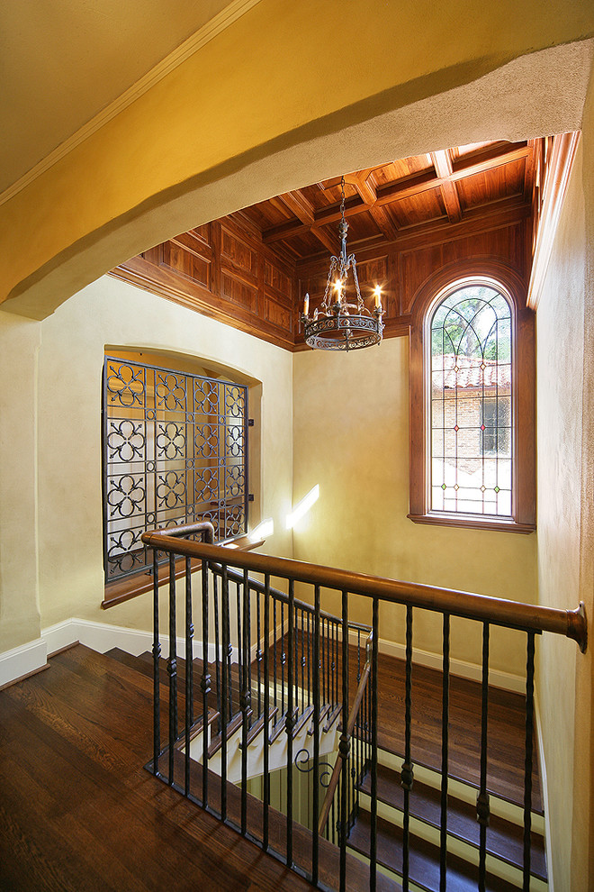 Wrought Iron Window Decor Staircase Mediterranean with Baseboards Coffered Ceiling Dark