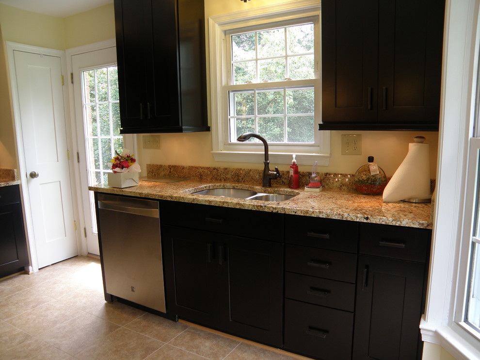 Oil Rubbed Bronze Kitchen Faucet Kitchen Traditional with Dark Maple Cabinetry Double
