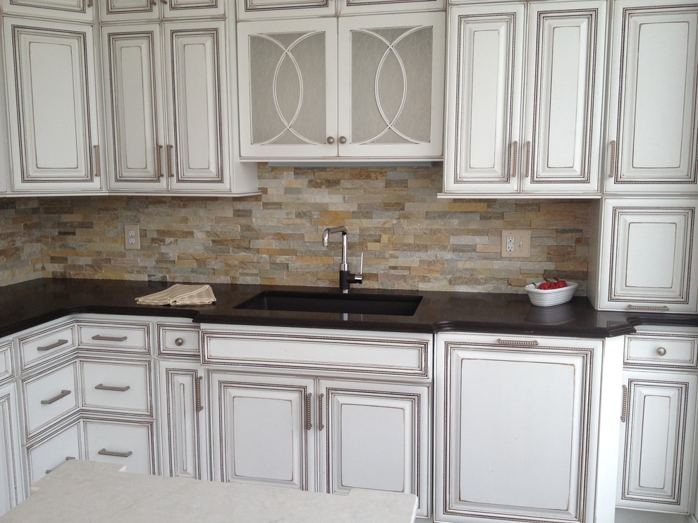 Redoing Kitchen Cabinets Spaces Transitional with Chocolate Stain Cream Island