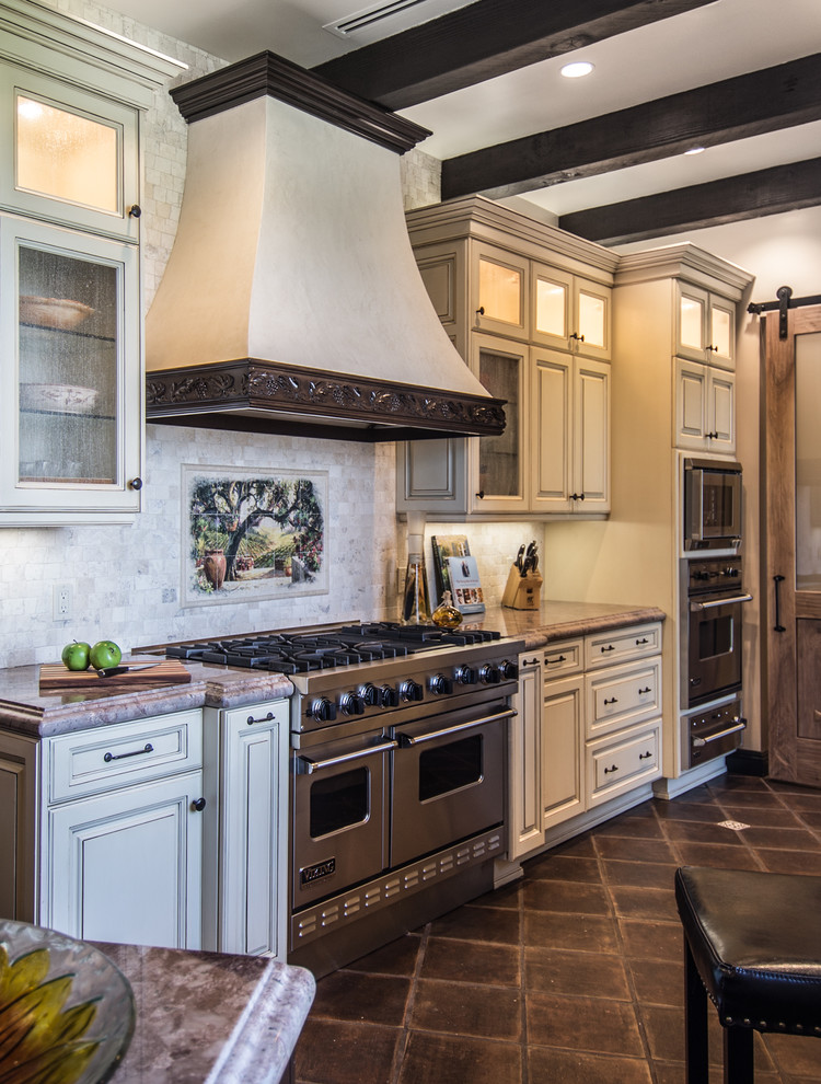 Rosti Tuscan Kitchen Kitchen Mediterranean with Antique Seedy Glass Cabinet