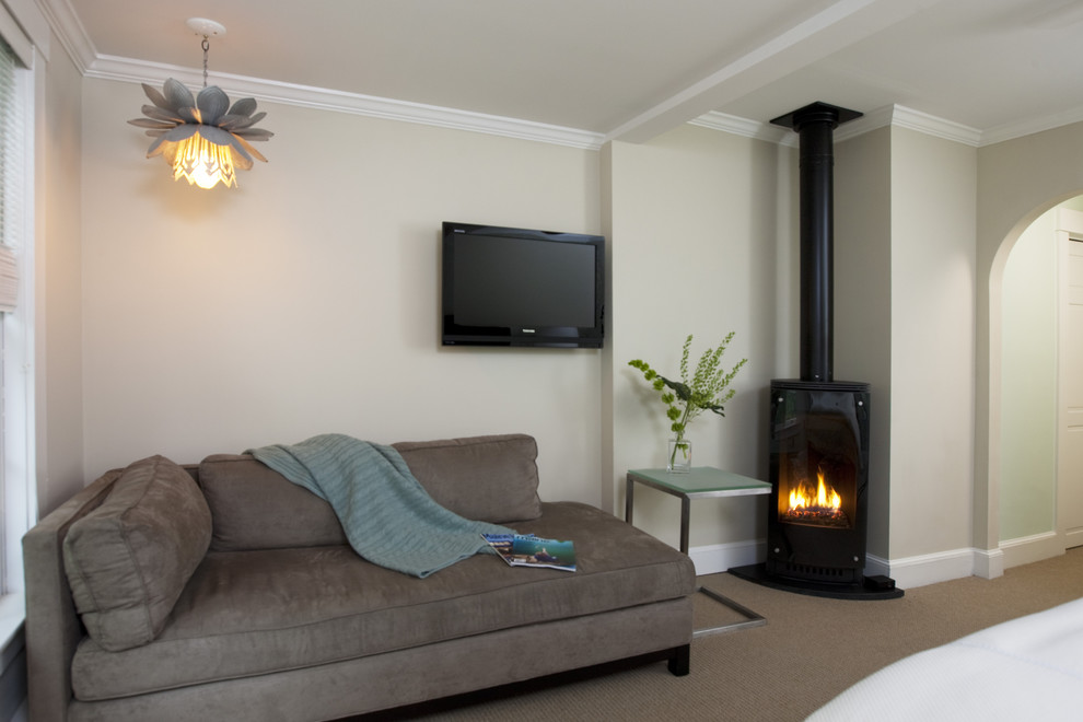 Corner Gas Fireplace for Contemporary Bedroom with Chrome Table