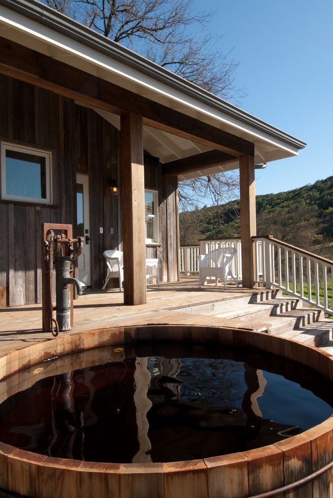 Delta Garden Tub Faucet with Farmhouse Porch Barrel Tub