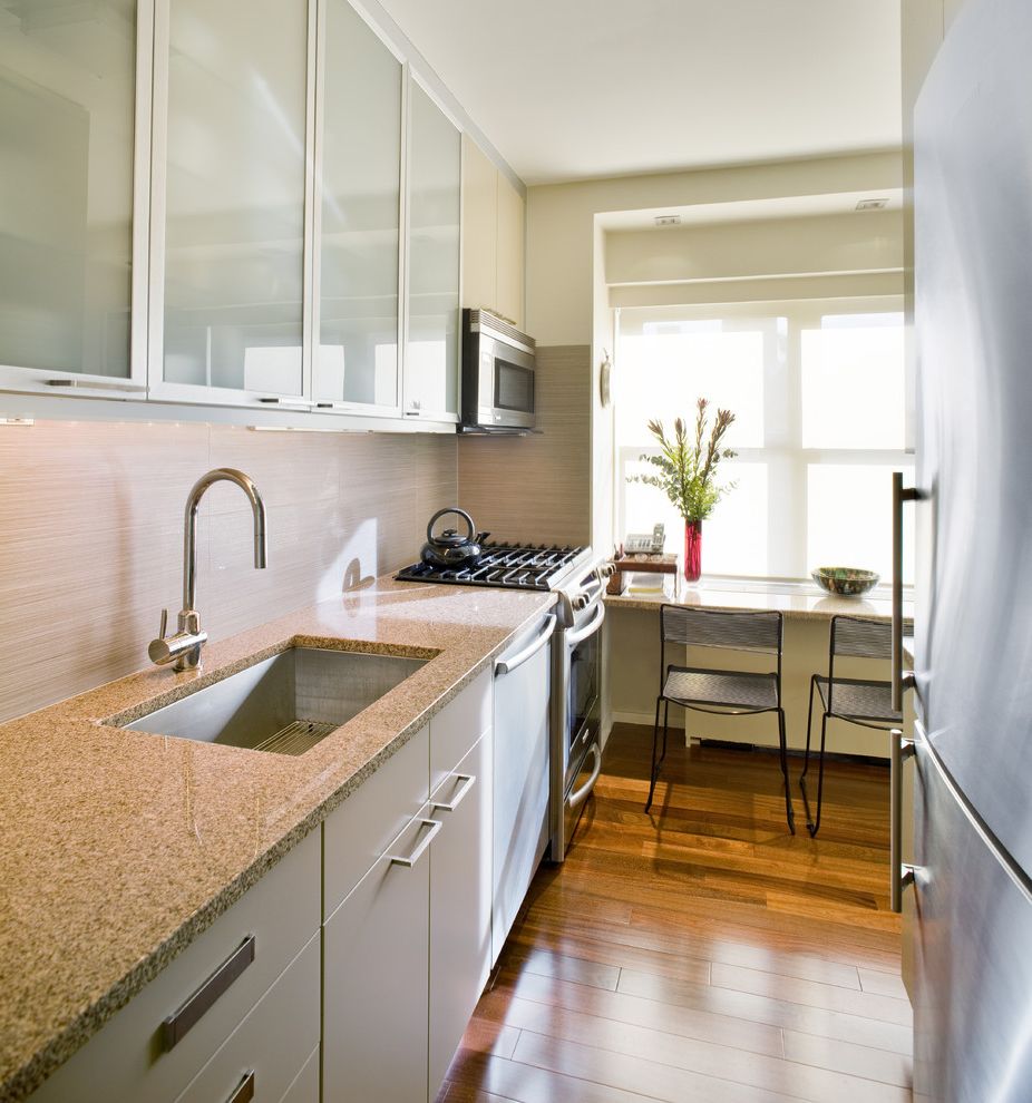 Hansgrohe Metro Higharc Kitchen Faucet with Contemporary Kitchen Stainless Steel Appliances
