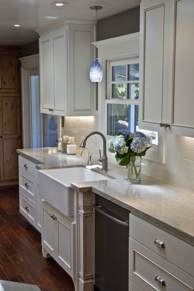 Hansgrohe Metro Higharc Kitchen Faucet with Traditional Kitchen Wood Floor