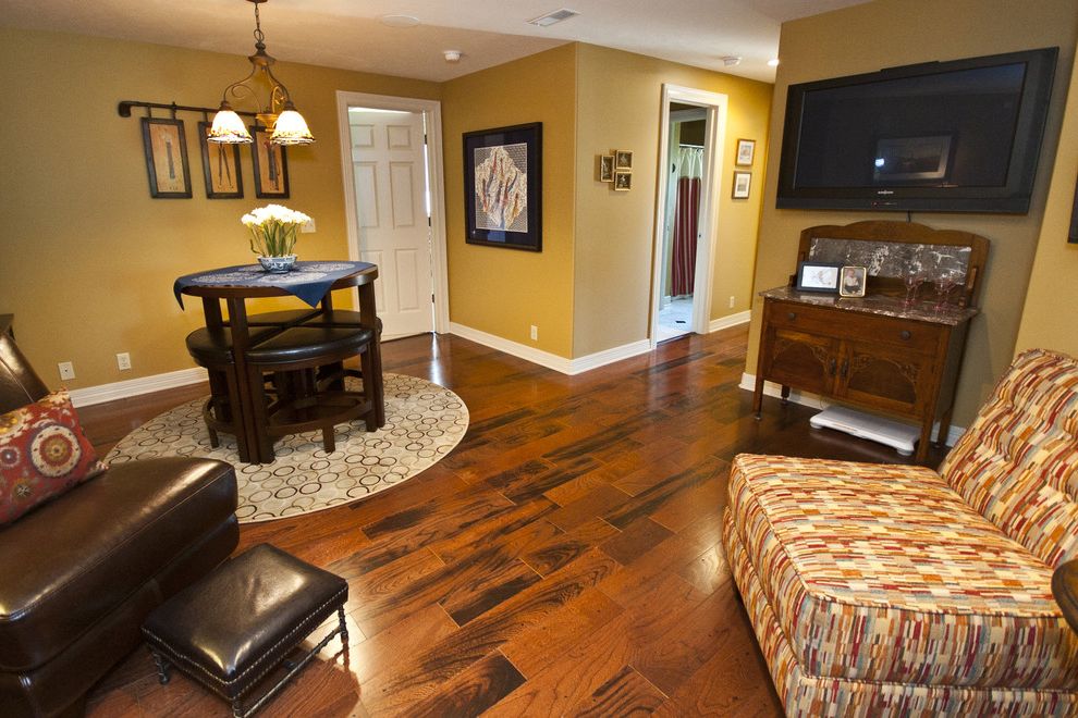 Cosco Rugs Traditional Basement with Brown Leather Ottoman