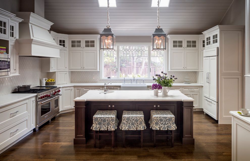 Le Creuset Outlet Online Traditional Kitchen with White Hood Cabinet