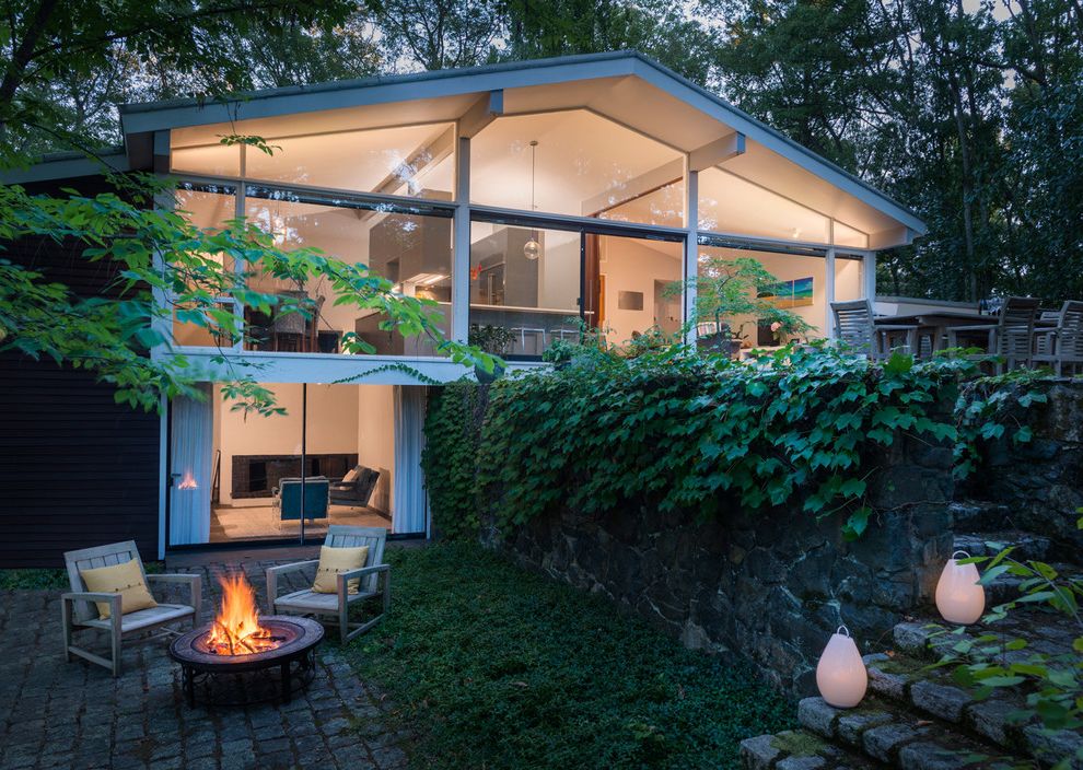 Primary Care of the Andovers Midcentury Exterior with Stone Wall