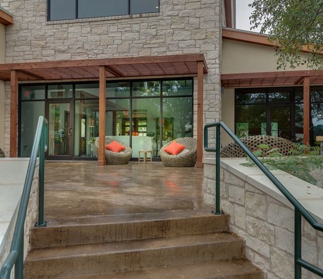 Behr Concrete Stain Traditional Patio with Stone Wall
