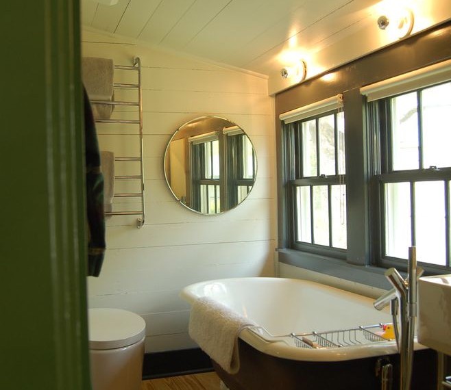 Cast Iron Clawfoot Tub Farmhouse Bathroom with White Wood
